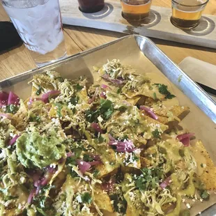 Nachos and a flight of beer