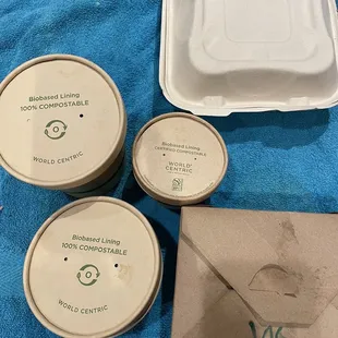 Yes! Recycled cardboard containers!
