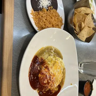 Is the stacked enchiladas. Beef enchiladas with housemate, corn tortillas, red and green salsa rice and black beans. Amazing.