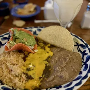 Enchilada, taco combo dish