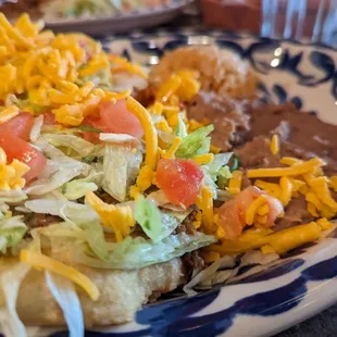 a plate of mexican food on a table
