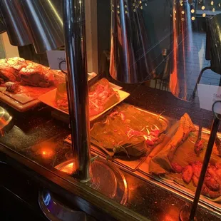 a variety of food items in a buffet