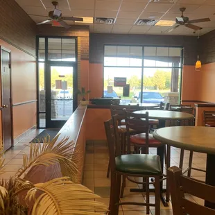 They have a spacious and clean eat in area.