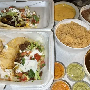 Tinga Taco, Steak Taco, Barbacoa Taco (American style), Rice &amp; Refried Beans, Consomé Sauce!