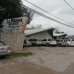 a parking lot with cars parked in it