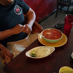 a man sitting at a table