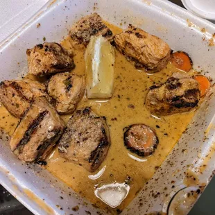 I always order shish tawook in lemon oregano sauce. It was served with a choice of two sides - salad and vegetables for me.