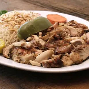 a plate of food on a wooden table