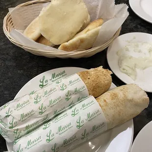 2x sandwiches (i took a bite of one) and complementary (dine-in) bread w/ garlic sauce