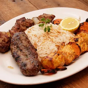 a plate of meat and rice