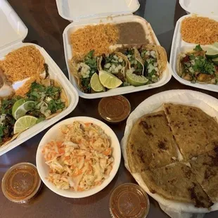 Asada and pollo tacos with pupusa
