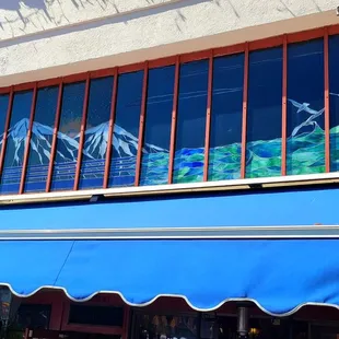 Beautiful stained glass of the snow covered mountains of Lebanon