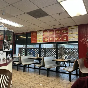 Interior dining area with menu in English