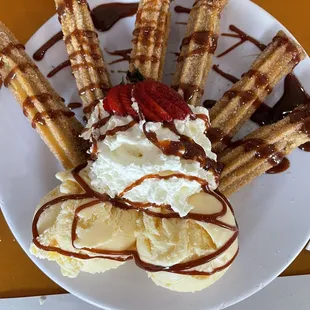 a plate of waffles and ice cream