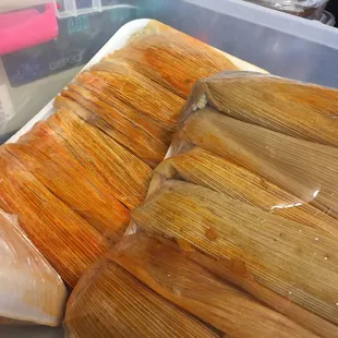 Fresh tamales!  Green=chicken red=pork