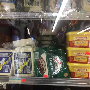a display of cheeses and breads
