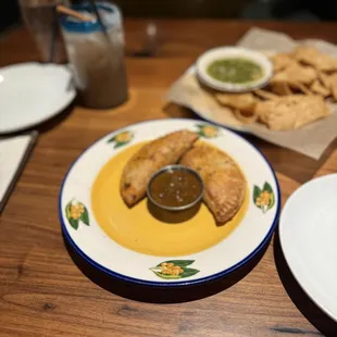 Empanadas and chips with salsa