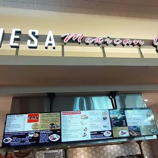 the sign above the restaurant