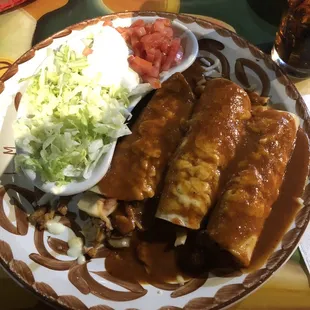 a plate of enchiladas