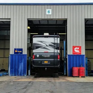 Our coach in Bay 6 during her radiator surgery ...