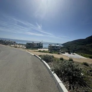 Our new rv in the middle! Sitting pretty on the coast for our first trip!