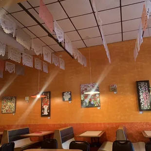 The atmosphere is beautifully decorated &amp; has artwork on the walls for sale