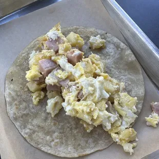 a tortilla with eggs and ham