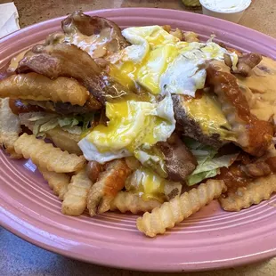 The breaking Bad burger! Double meat, bacon, eggs, French fries and chile.