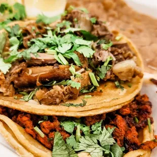 Carnitas and adobada tacos