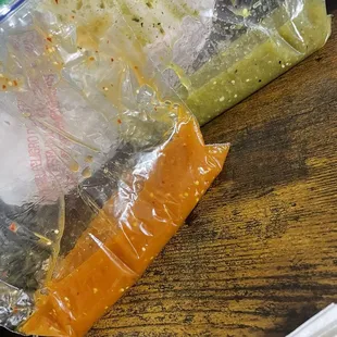 Red and green sauce to go. I like my extras