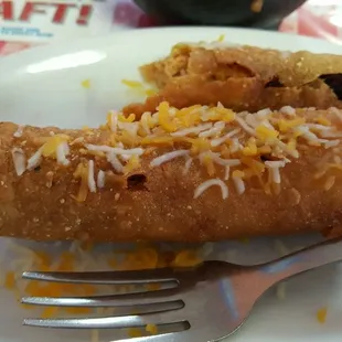 Side chicken flautas. I've already taken a few bites of one.