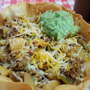 Taco salad with no tomatoes or sour cream.