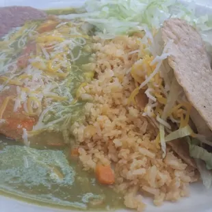 Combo plate. I picked chicken enchilada, crispy beef taco, and chicken tamale.
