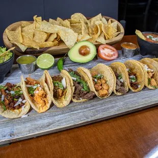 a platter of tacos and chips