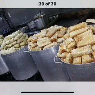 a bunch of food in buckets