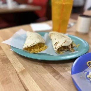 Potato &amp; egg and chorizo &amp; egg tacos with cheese