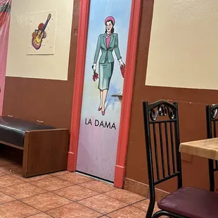 Door to women's restroom.