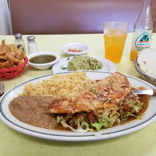 Chicken Taco Dinner, chips, salsa, and guacamole. Note the corn tortillas the size of a plate!