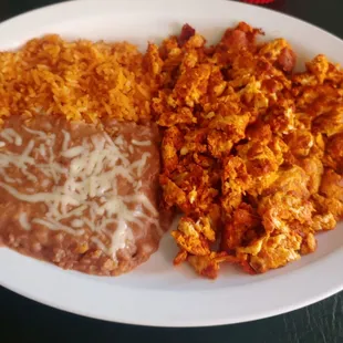 Chorizo and eggs with rice and beans.