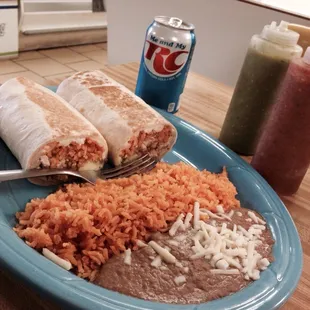 Whole chicken burrito with beans, rice and an RC Cola! Two bottles of house made salsa.