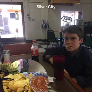 Carson going nuts over the amazing salsa.