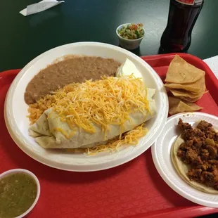 Pastor burrito and taco.   Green chile one of the best I've had.    This place is very good and clean and the chips r delicious!