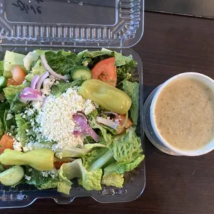 Small Greek Salad with cup of lemon rice
