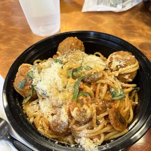 Spaghetti meetballs with pamarsian cheese topping