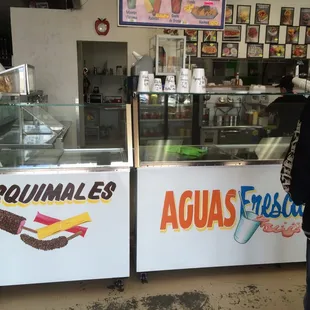 a man standing in front of a counter