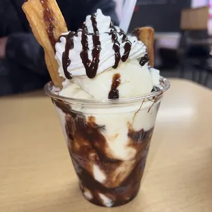 Churro with rum raisin ice cream