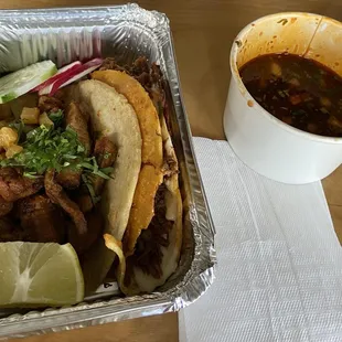 Al Pastor taco; Birria taco. (Highly recommend the birria!)