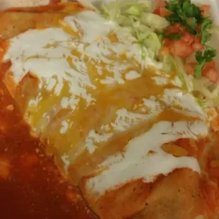 Wet burrito in red sauce
