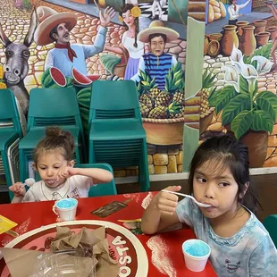 Daughters enjoying their bubble gum Ice cream