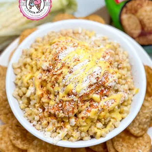 Esquites Locos 
Made with Tostitos chips, corn, cheese, butter, mayo &amp; Tajin only @Lamichoacanacostamesa